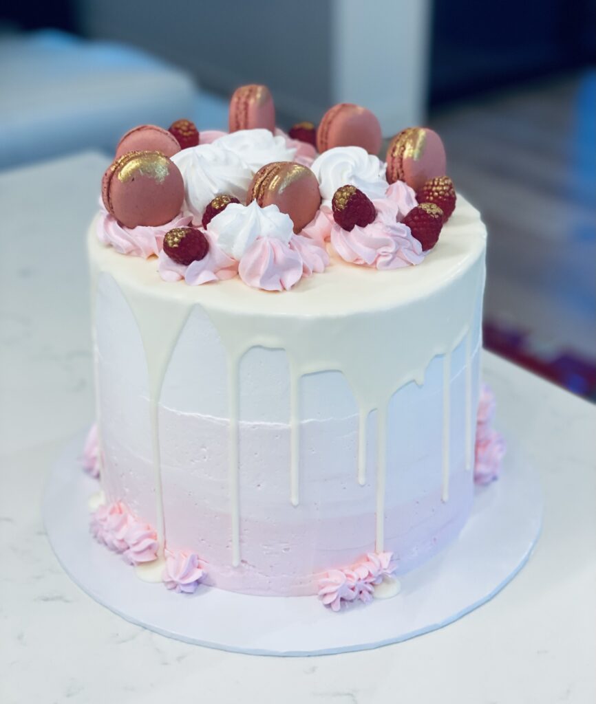 Drip Cake With Pink Macarons - Sweet infusion Cakes