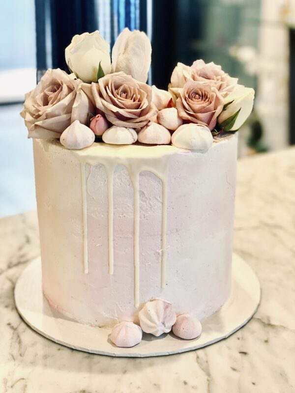 Pale Pink White Drip Cake With Fresh Flowers - Sweet infusion Cakes